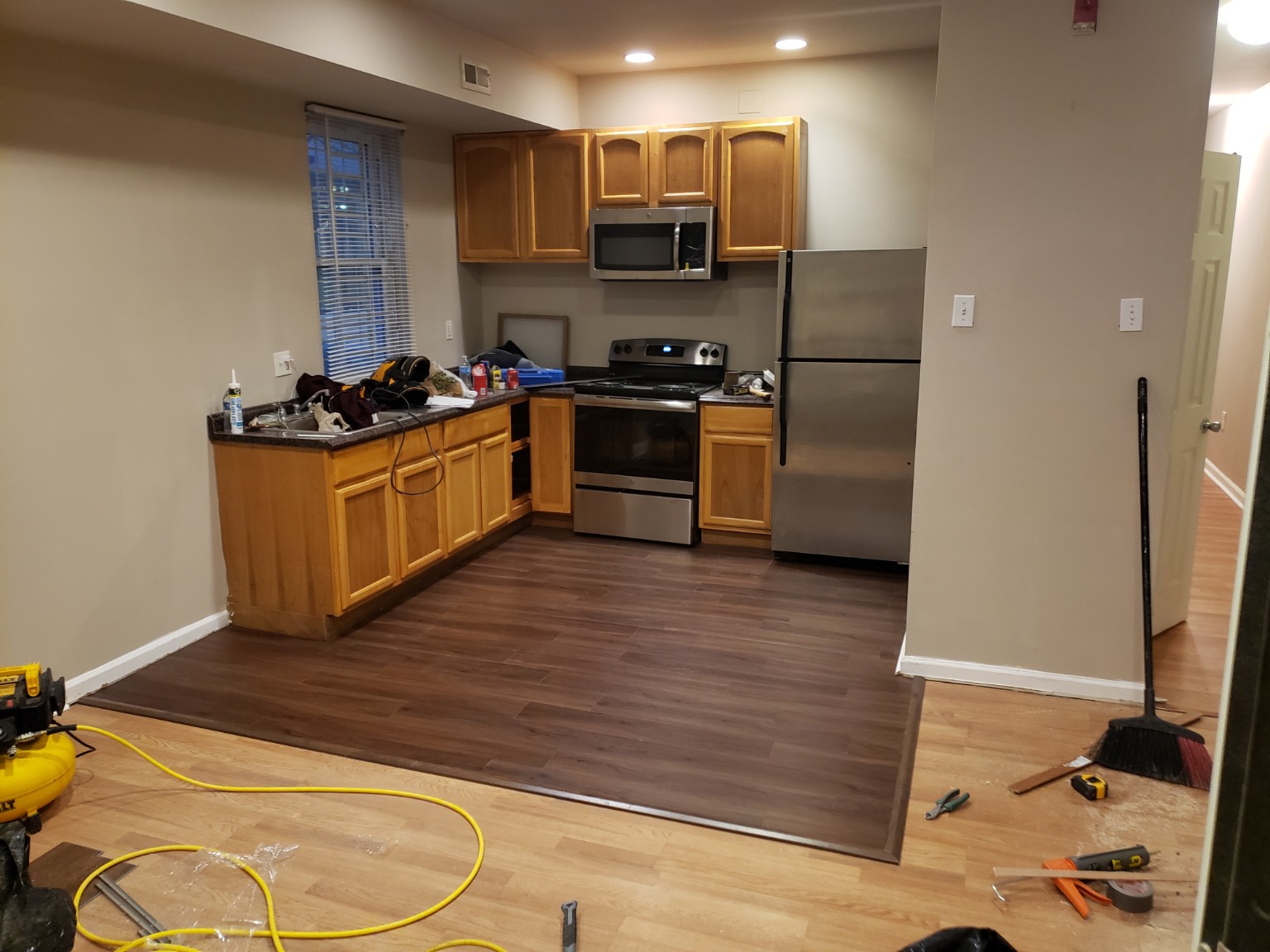 Kitchen flooring installation in progress