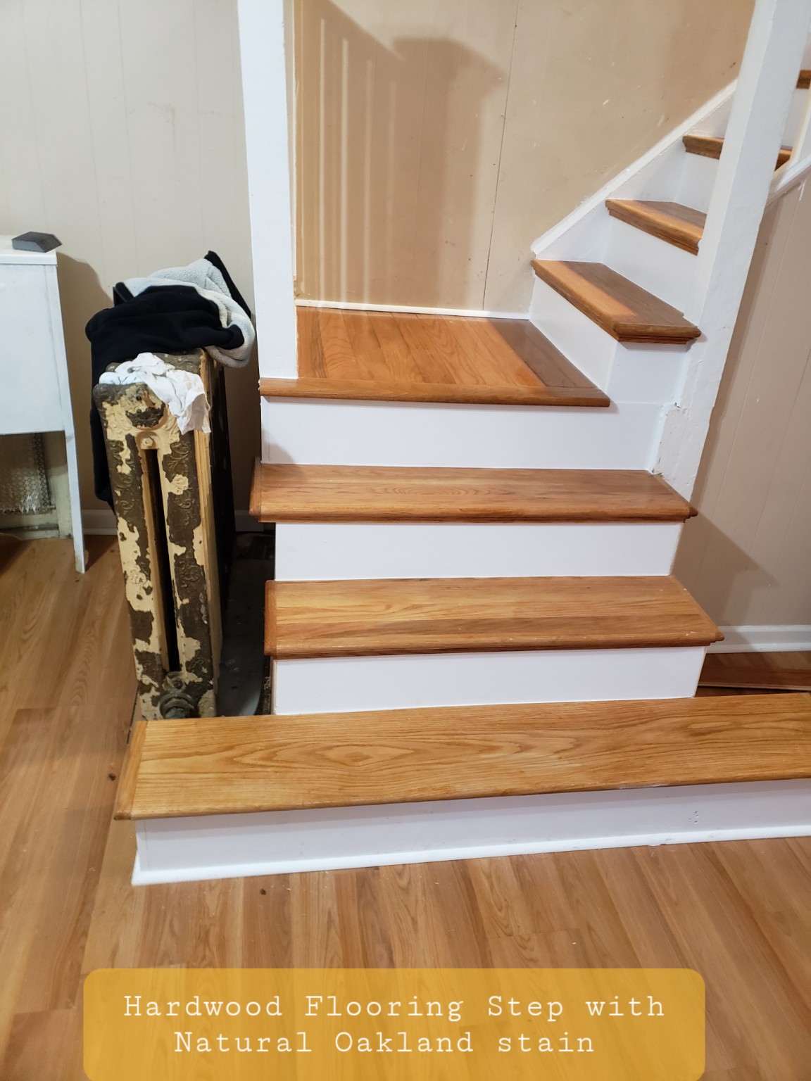 Hardwood staircase steps with natural oak stain